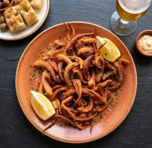 Rejos fritos tiernos y crujientes con limón